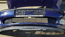 Bara spoiler față proiectoare Opel Vectra B 1995...
