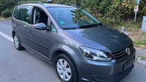 Broasca usa stanga fata Volkswagen Touran 2011 Mon...