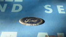 Emblema Ford Escort 1998; 95AB8K141AA (spate)