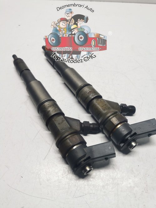 Injector Bmw seria 5 E60 E61 525D M57 2.5D injectoare 7794652