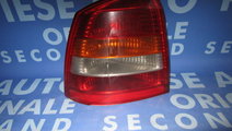 Lampi spate Opel Astra G ; 90521542 (fisurata) 5-h...