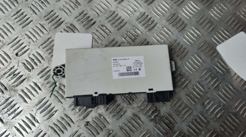 Modul CAS BMW seria 7 F01 F02 3.0 D 245cp/180Kw cod motor N57-D30A ,an 2010 cod 9205692