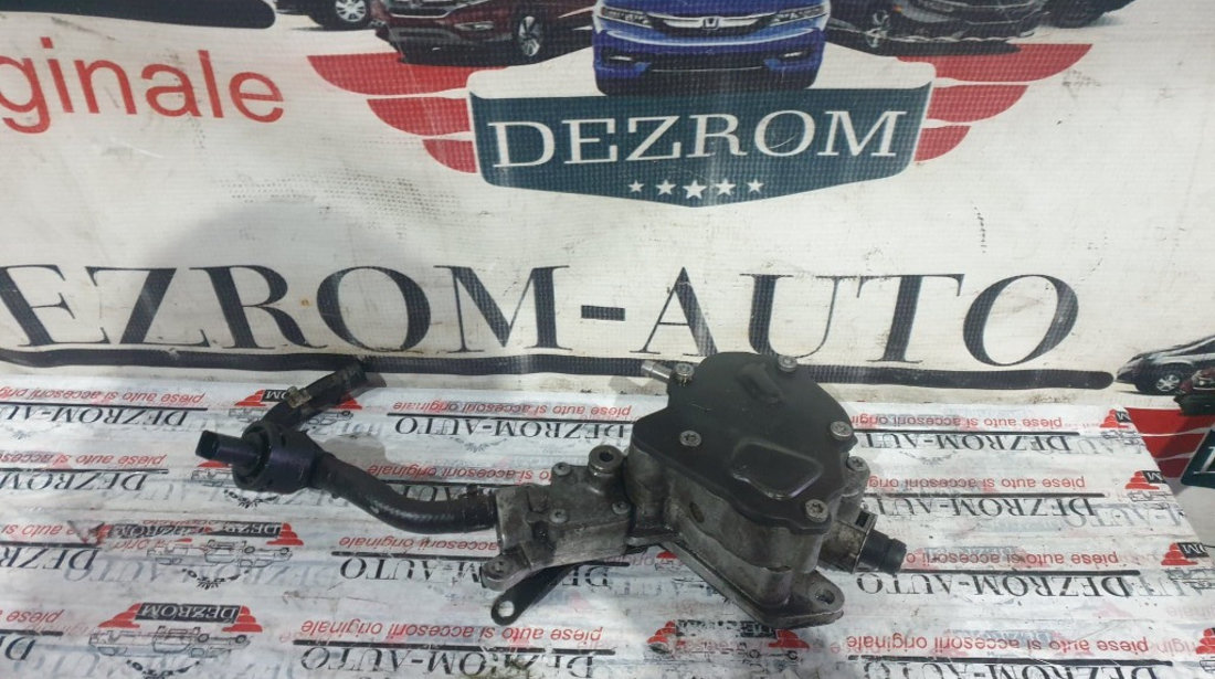 Pompa vacuum originala VW New Beetle 1.9 TDI 105 cai cod piesa : 038145209N