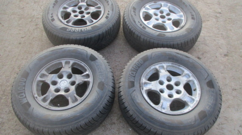 SET 4 JANTE ALIAJ R16 / J16x7JJ ET46 CU ANVELOPE MITSUBISHI PAJERO SHOGUN III FAB. 1999–2007 ⭐⭐⭐⭐⭐