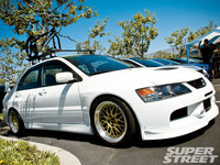 Click image for larger version

Name:	sstp_0911_04+mitsubishi_owners_day_2009+evo_ix.jpg
Views:	32
Size:	573.5 KB
ID:	1454712