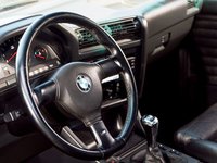 Click image for larger version

Name:	eurp_0711_09_z+1986_bmw_325e+steering_wheel.jpg
Views:	73
Size:	51.0 KB
ID:	1198766