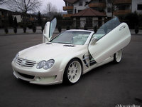 Click image for larger version

Name:	07FAB_DESIGN_Mercedes_SL_Class_Mega_Wing_Wide_Body_3.jpg
Views:	66
Size:	139.9 KB
ID:	909176