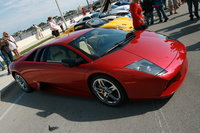 Click image for larger version

Name:	red_lamborghini_murcielago_coupe_3.JPG
Views:	78
Size:	307.0 KB
ID:	942679